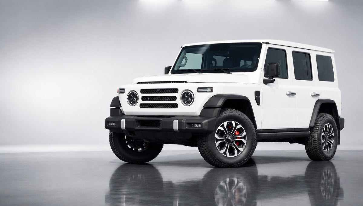 White BAW 212 off-road SUV with red TEI T665 six-piston brake calipers in a light studio