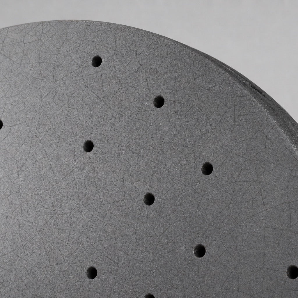 TEI Brakes — TCCB Carbon Fiber Ceramic Rotor — macro of the SiC-coated carbon-ceramic friction surface — real photo