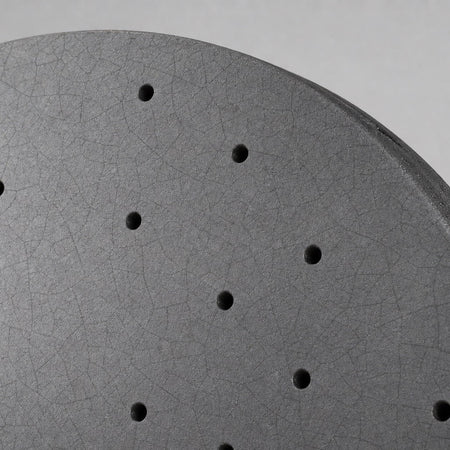 TEI Brakes — TCCB Carbon Fiber Ceramic Rotor — macro of the SiC-coated carbon-ceramic friction surface — real photo