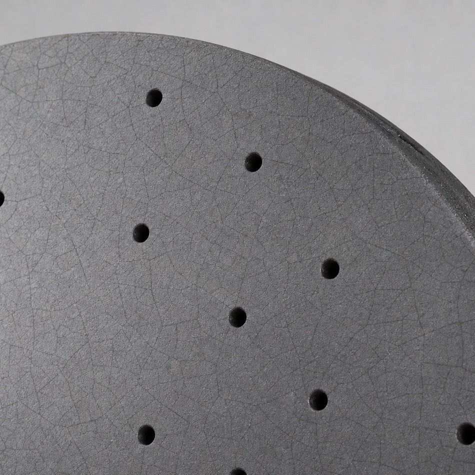 TEI Brakes — TCCB Carbon Fiber Ceramic Rotor — macro of the SiC-coated carbon-ceramic friction surface — real photo